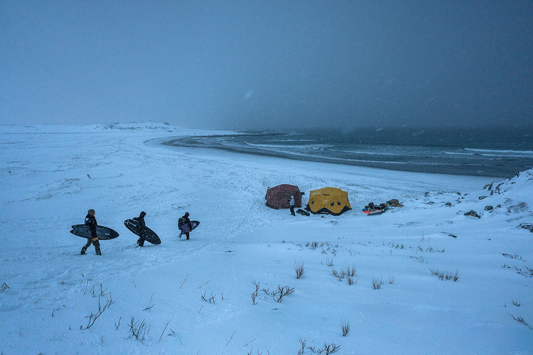 surfers walking