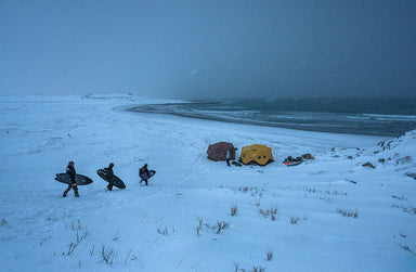 surfers walking