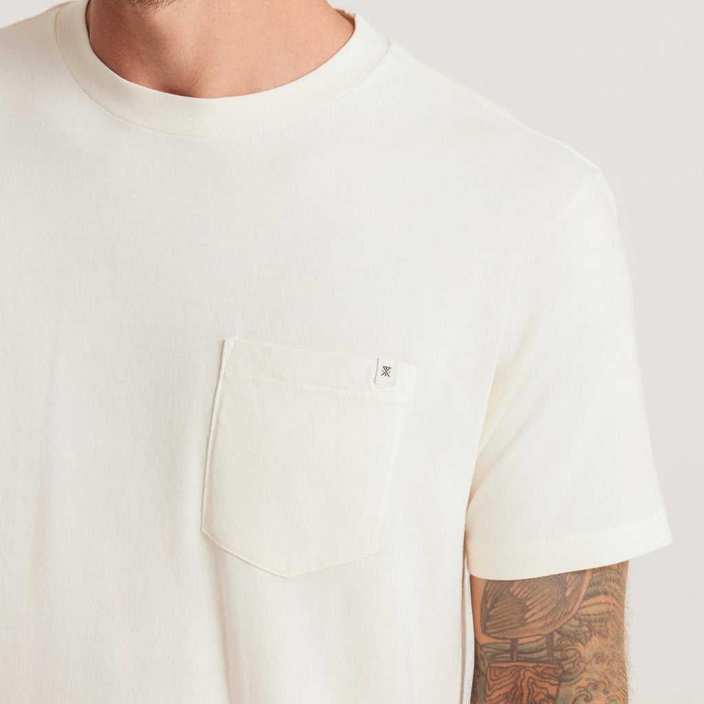 A close-up of the white Roark t-shirt, emphasizing the stylish pocket detail and subtle branding for a modern touch. Big Image - 5
