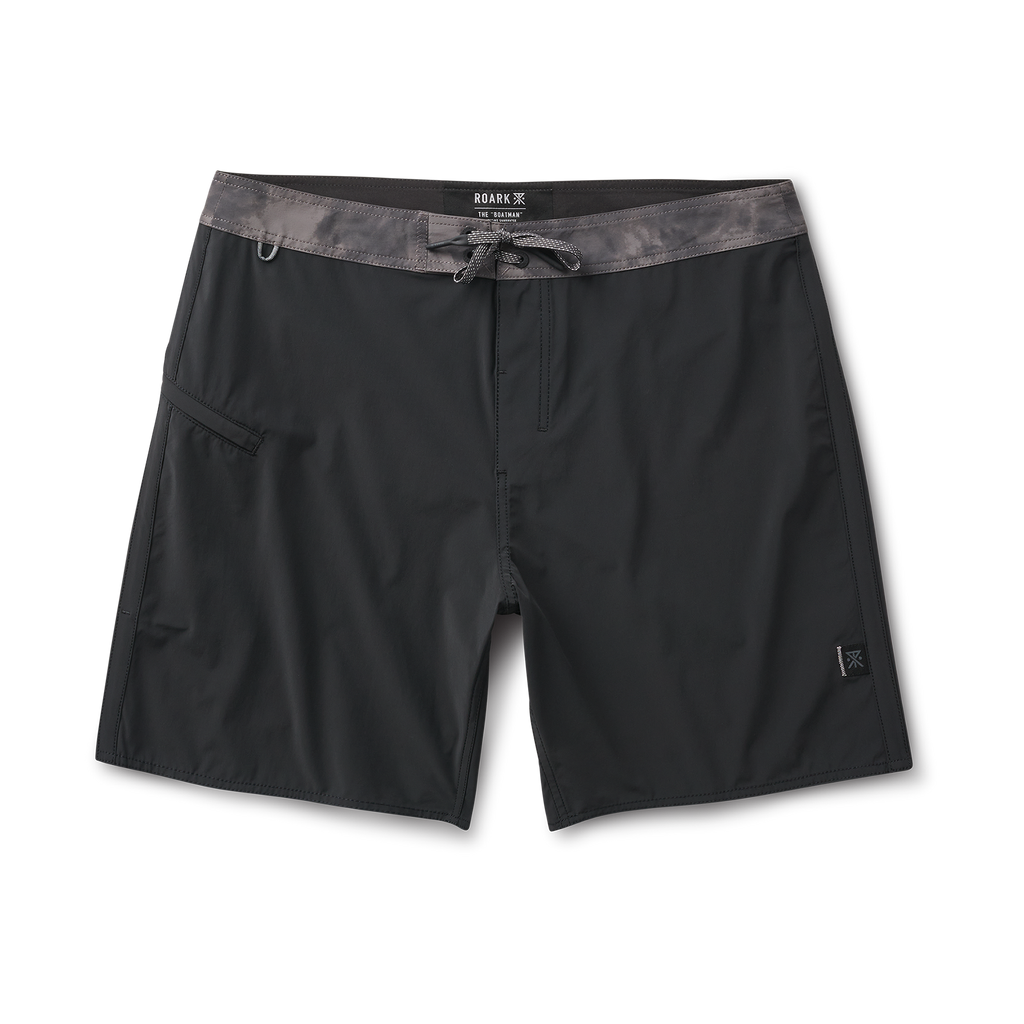 Front view of black boardshorts with a gray waistband, featuring a sleek and functional design for versatile performance. Big Image - 1