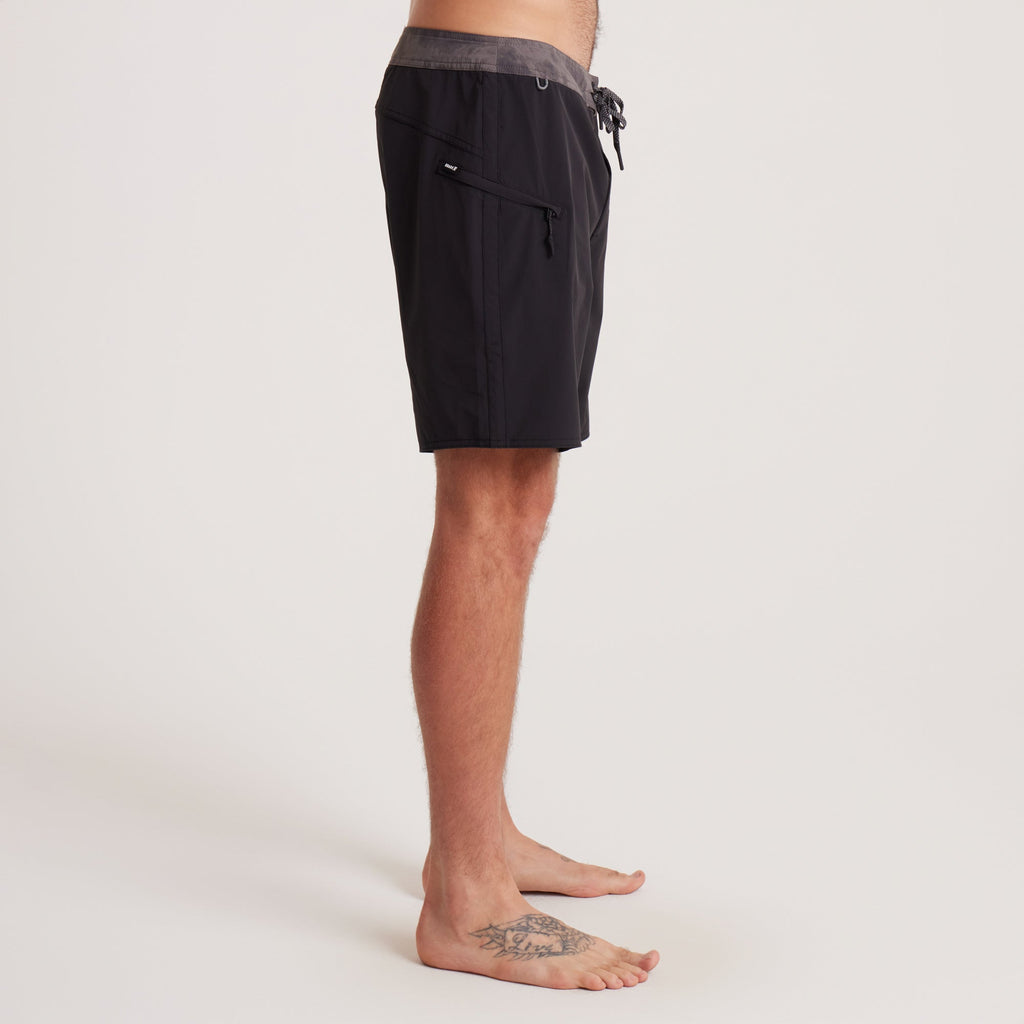 Side profile of Roark black boardshorts with a close-up of the waistband and premium construction, ideal for active lifestyles. Big Image - 5