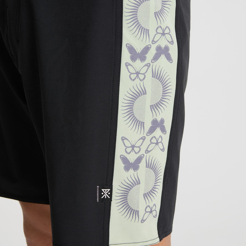 Versatile black boardshorts perfect for adventure and outdoor activities, featured in Roark's collection. Big Image - 7