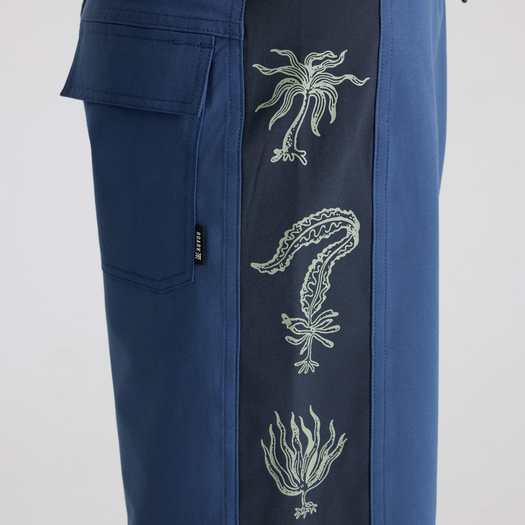 Dynamic blue active pants designed for adventure and travel by Roark, ideal for outdoor exploration and comfort. Big Image - 6