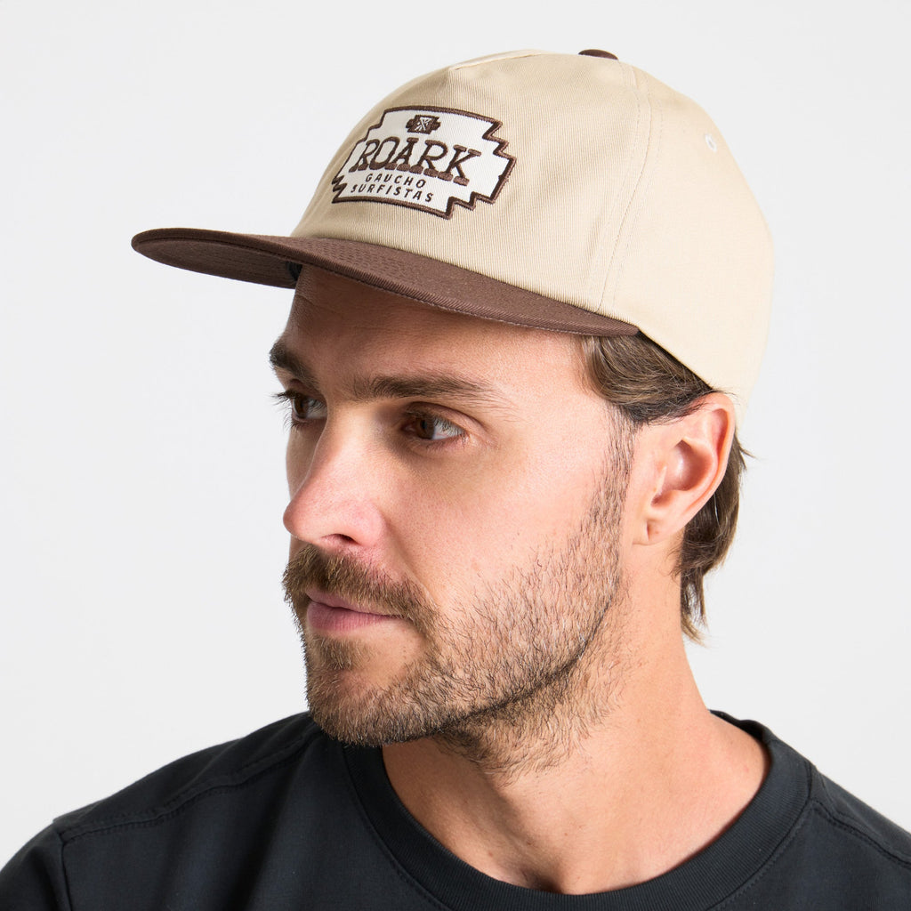 Adventure-ready man with a rugged beard wearing a versatile cap, perfect for outdoor explorations. Big Image - 8