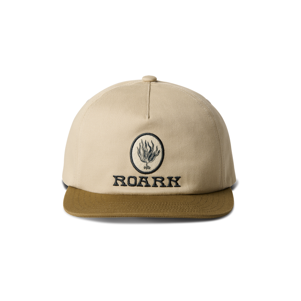 Roark logo on a cricket cap with a distinctive label, embodying the adventure and outdoor spirit. Big Image - 1