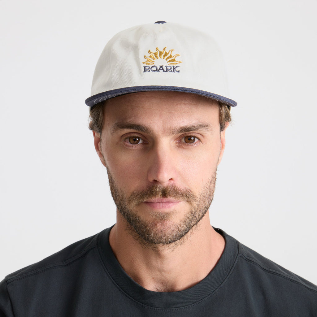Adventurous traveler sporting a Roark cricket cap outdoors Big Image - 2