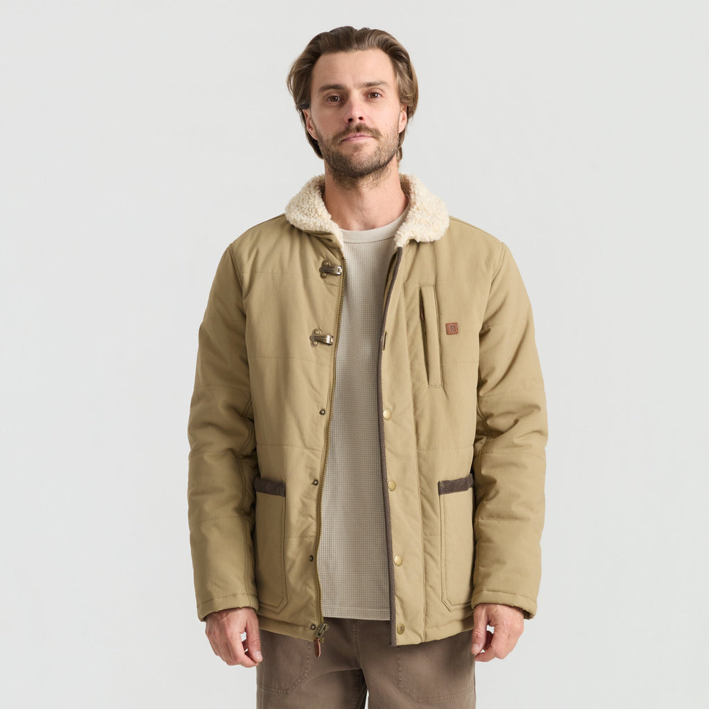 Roark adventure-themed image in khaki tones, ideal for outdoor and travel enthusiasts. Big Image - 2