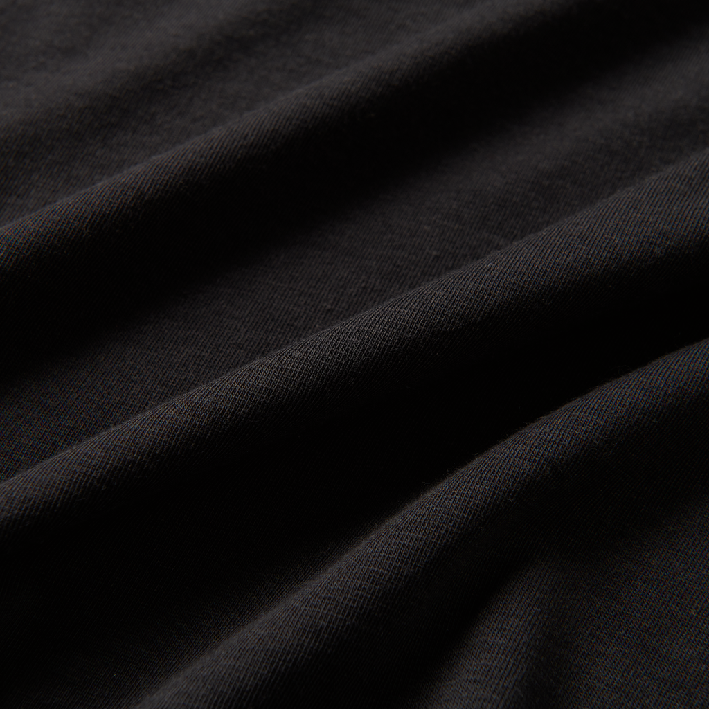 A close-up image of the Roark Mathis Core Short Sleeve Tee in black, showcasing the details and craftsmanship. Shop the official Roark store now. Big Image - 5