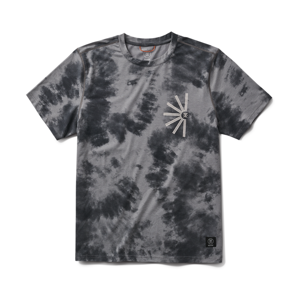 Outdoor adventure enthusiast in casual gear exploring a scenic trail with Roark branding Big Image - 1