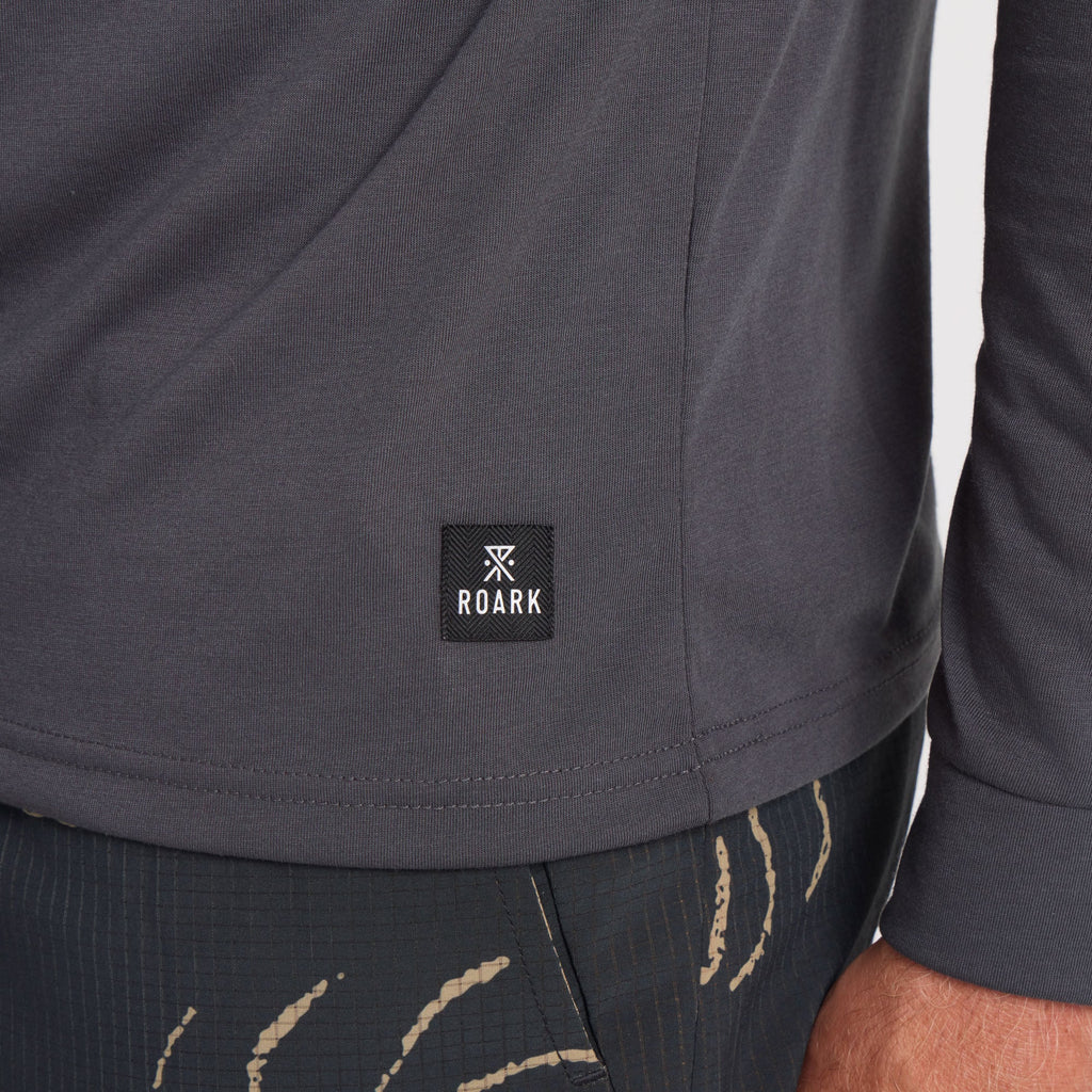 Long-sleeved active shirt designed for adventure and travel by Roark, featuring durable sleeves perfect for outdoor activities. Big Image - 7