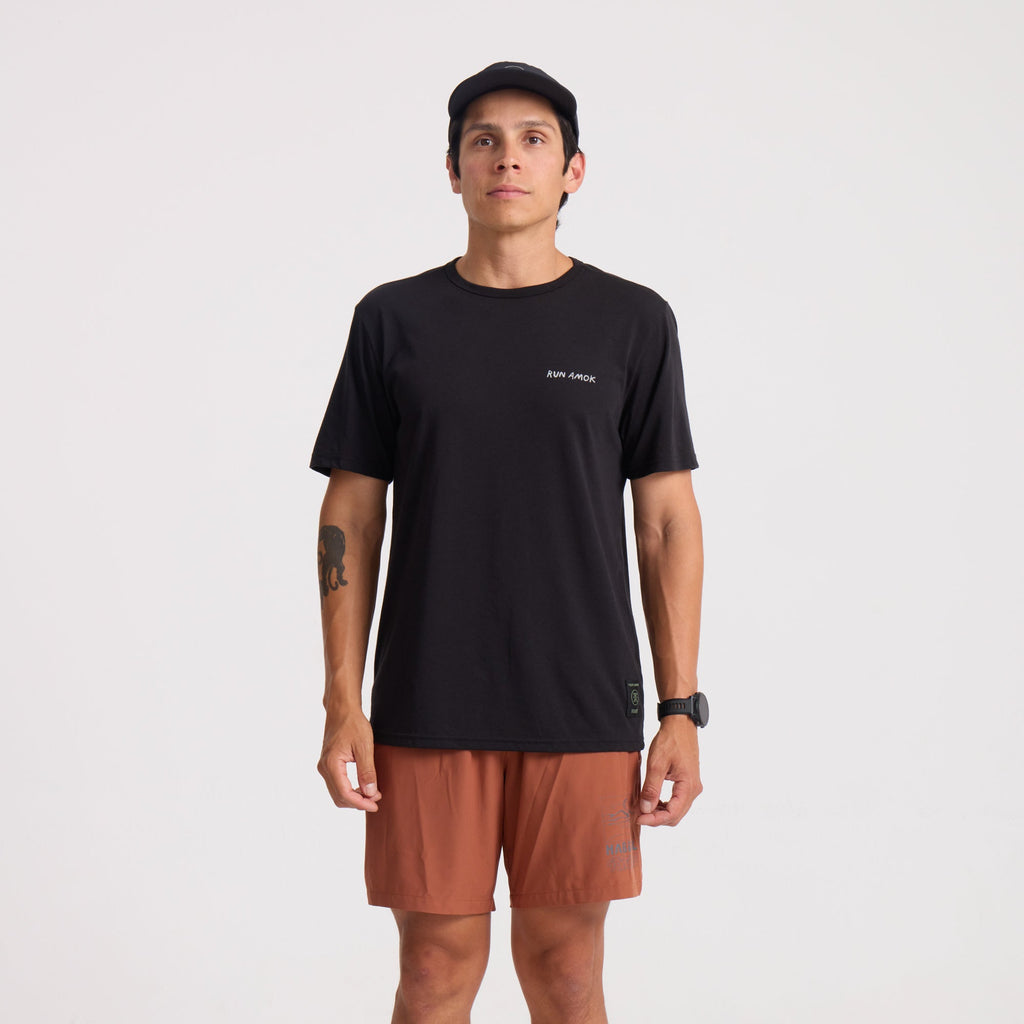 Active shirt and multiple styles of shorts designed for outdoor adventures, showcasing Bermuda shorts, boardshorts, and trunks in black, perfect for travel and exploration. Big Image - 2