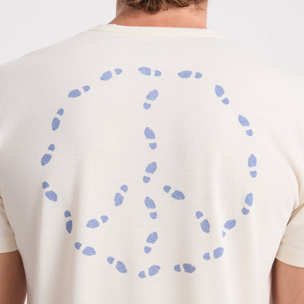 Adventurous traveler exploring scenic outdoor location with Roark gear. Big Image - 7