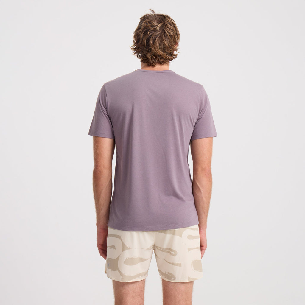 Active person wearing a grey Roark sleeve shirt with matching boardshorts, ready for an adventurous day outdoors. Big Image - 4