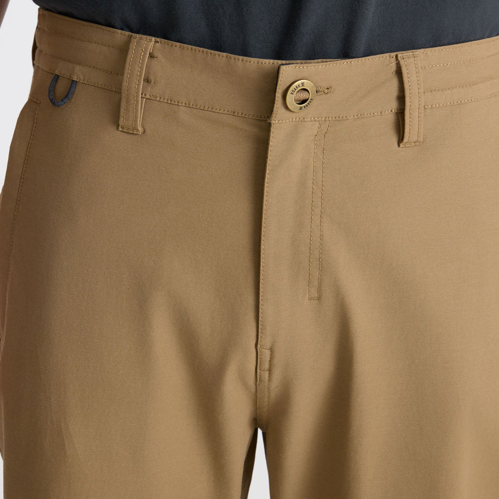 Scenic view of a sports venue surrounded by dense conifer forest, capturing the essence of adventure and nature. Big Image - 5