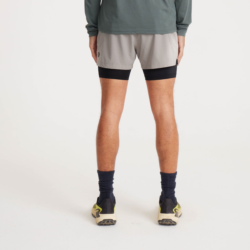 Back view of Roark running shorts highlighting their functional design and secure fit for outdoor adventures and athletic activities. Big Image - 4