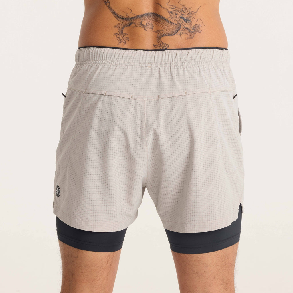 Back view of Roark running shorts with an elastic waistband and lightweight fabric, ideal for performance and comfort. Big Image - 10