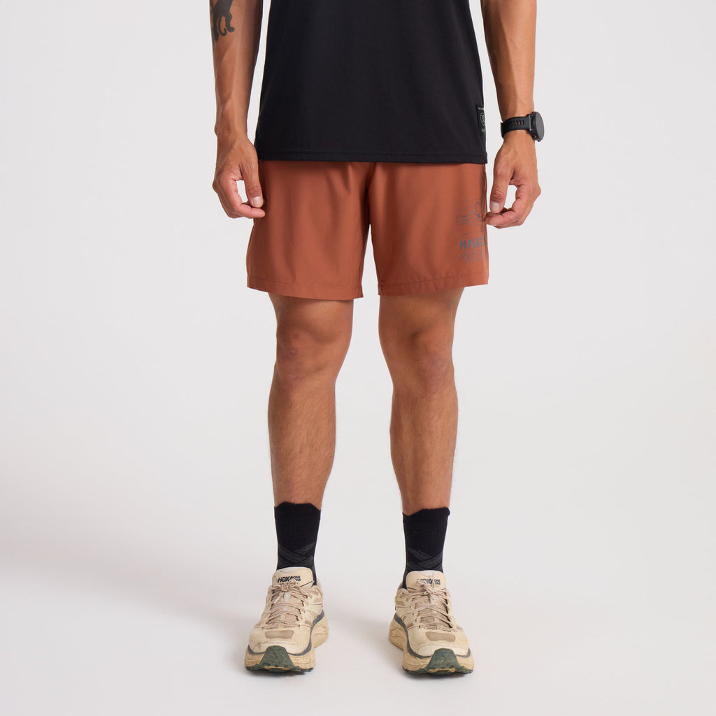Bermuda shorts and visible calf in an outdoor adventure setting, perfect for travel and exploration. Big Image - 2