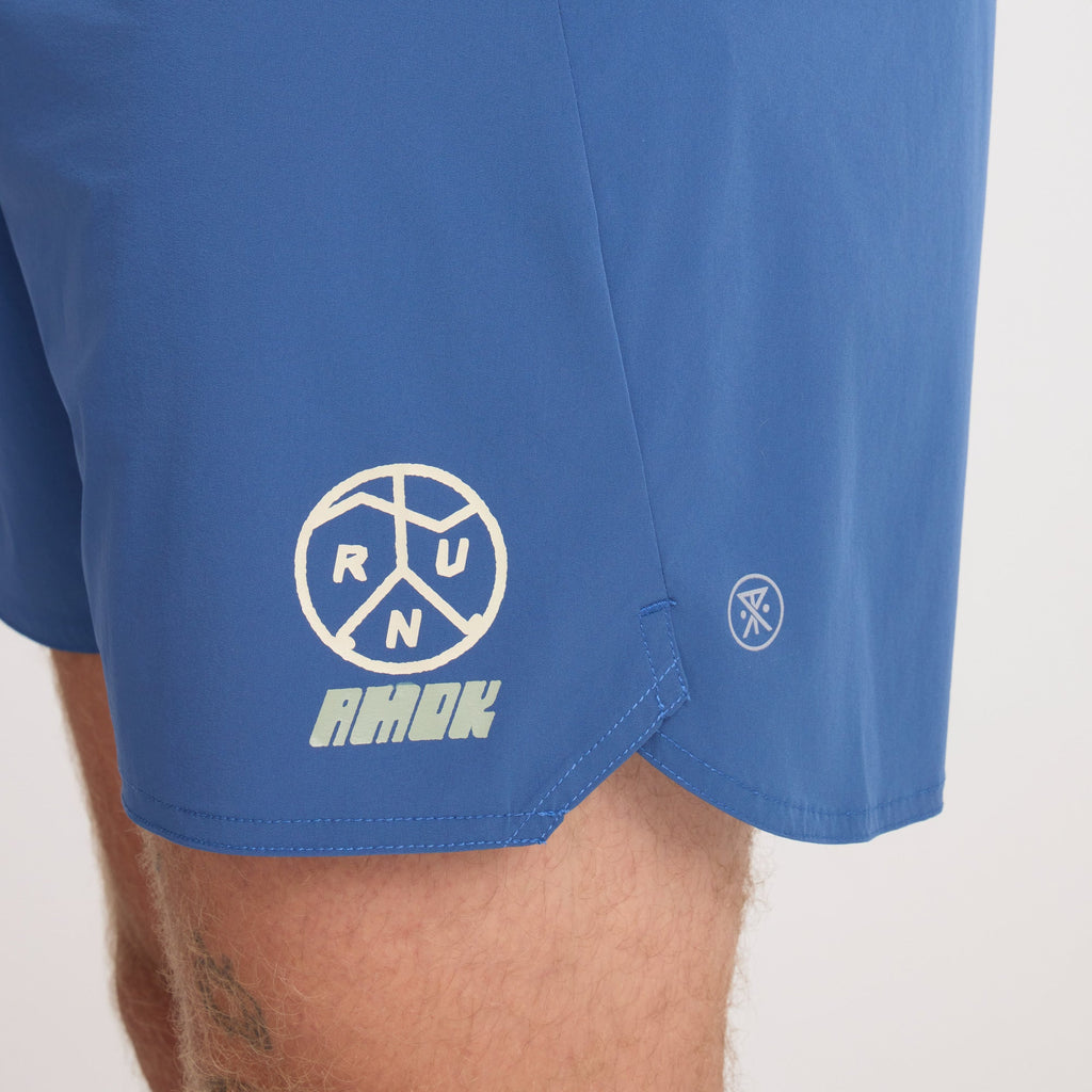 Variety of Roark adventure-ready apparel including active shorts, active shirt, trunks, Bermuda shorts, and boardshorts laid out, ready for an outdoor expedition Big Image - 5