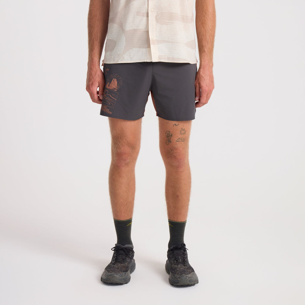Variety of Roark men's shorts including active shorts, boardshorts, and Bermuda style, displayed on a model focusing on lower body and calf detail, perfect for adventure and travel. Big Image - 2