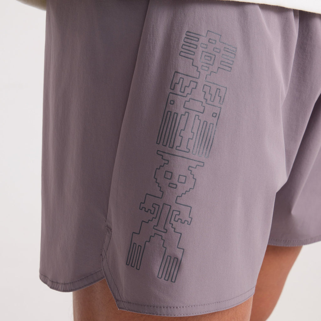 Bermuda shorts and boardshorts paired with an active shirt, perfect for adventure and outdoor activities by Roark. Big Image - 5