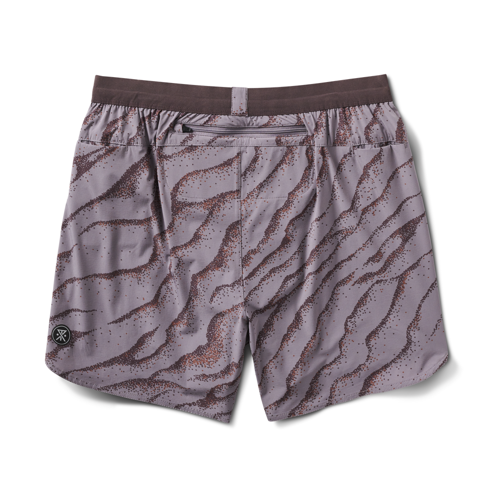 Back view of running shorts showcasing a secure zippered pocket and dynamic purple pattern for practical and stylish athletic wear. Big Image - 11