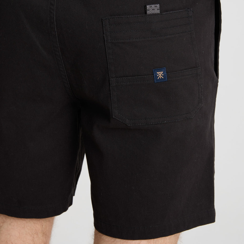 Adventure-ready Roark apparel displayed in an outdoor setting, blending with the natural scenery. Big Image - 6