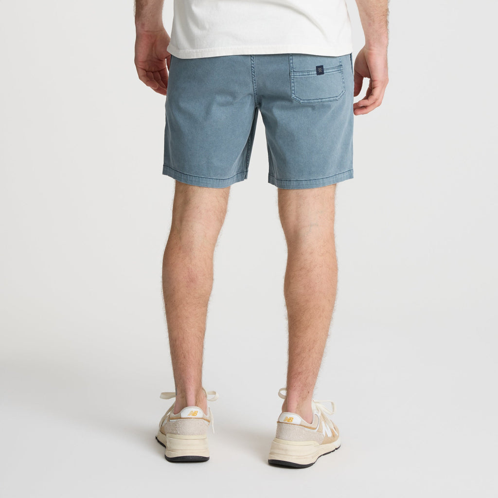 on-model Bermuda shorts on a sandy beach evoking the spirit of adventure and exploration aligned with Roark's ethos. Big Image - 4