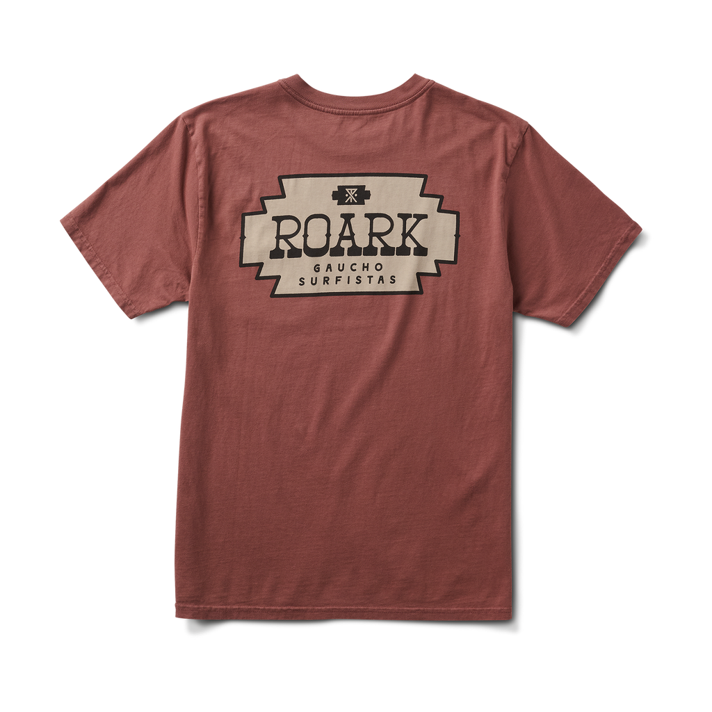 Close-up of an active shirt label from Roark, showcasing style RT1451 in a rugged outdoor setting. Big Image - 1