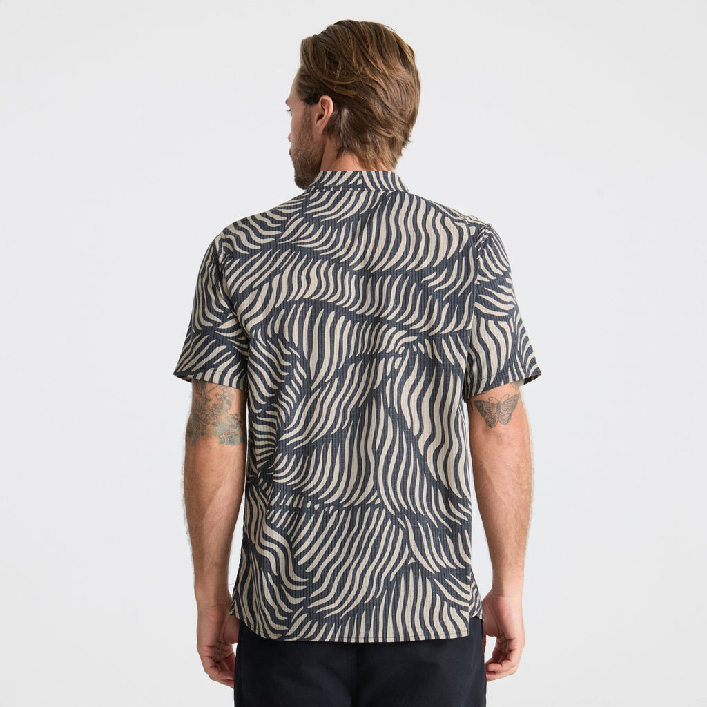 Close-up of a durable button on Roark outdoor apparel, designed for adventure and travel. Big Image - 5