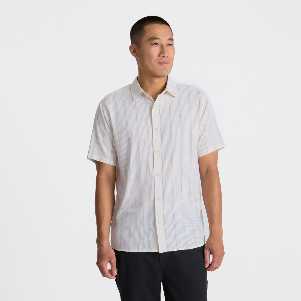Dress shirt with visible collar, buttons, and sleeves designed for adventure and travel by Roark, crafted to blend style and functionality. Big Image - 4