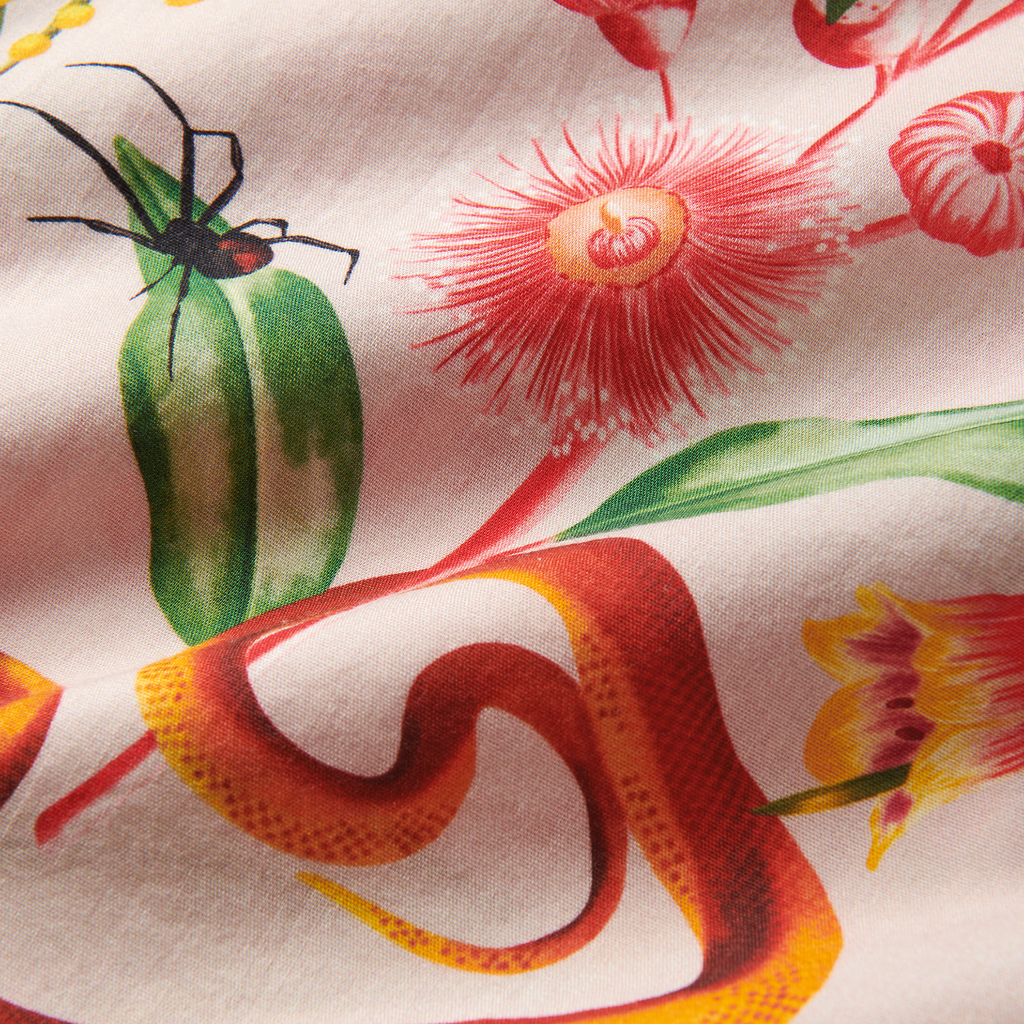 Assorted natural red and pink fruits arranged outdoors, evoking a sense of adventure and travel. Big Image - 15