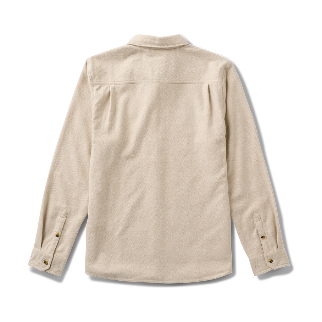 Close-up of a durable button on adventure apparel, emphasizing Roark's commitment to quality and durability in outdoor gear. Big Image - 6