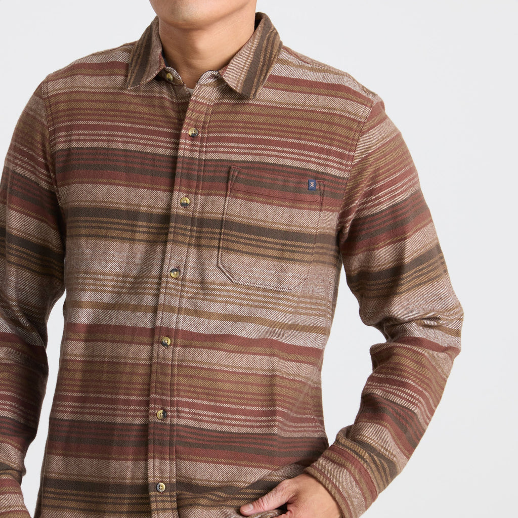 Close-up view of a brown textured material, evoking the rugged, outdoor essence of adventure and travel. Big Image - 4