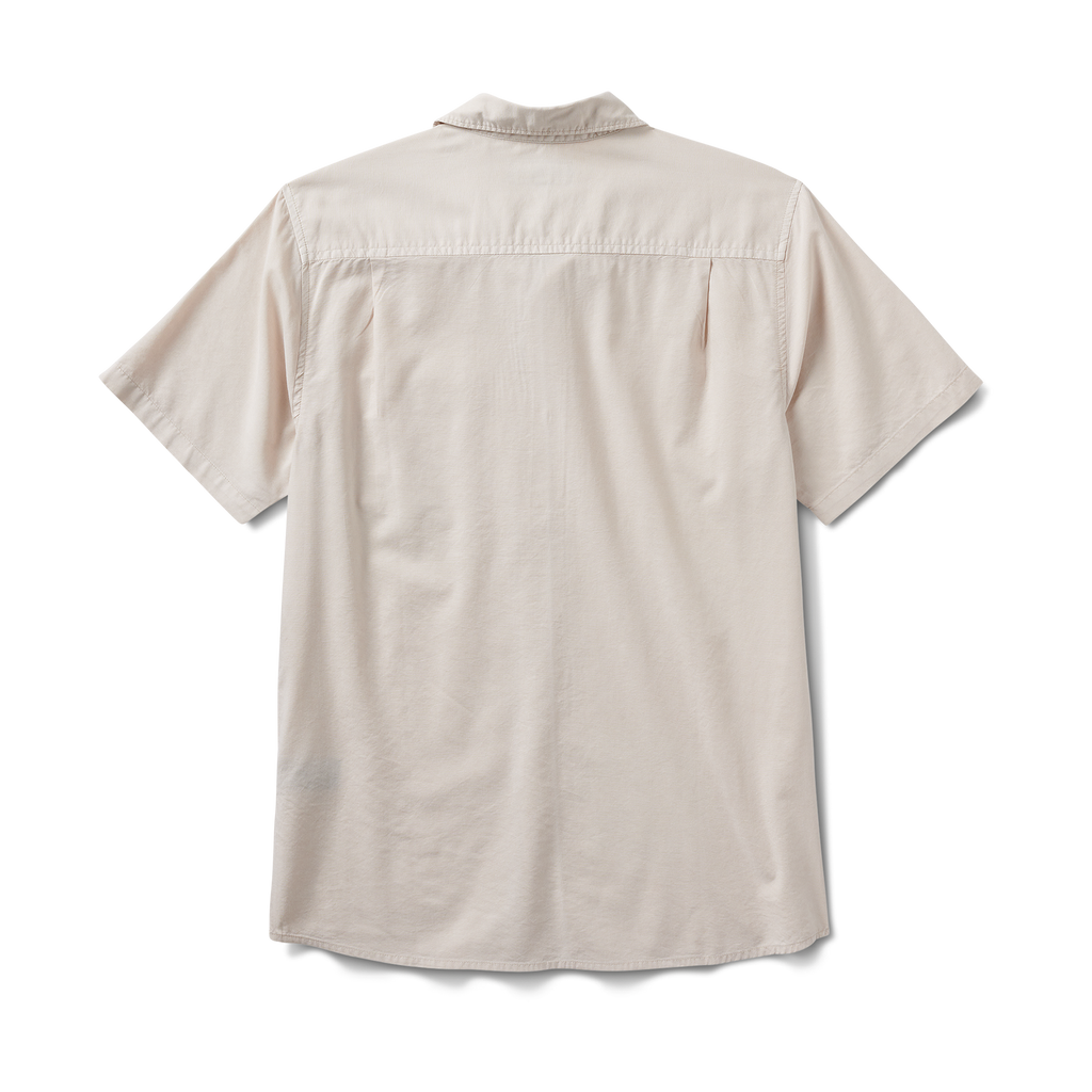 Back view of the Roark Made To Fade Short Sleeve Button Up Shirt in Washed Bone, showcasing its lightweight fabric and relaxed fit. Big Image - 10