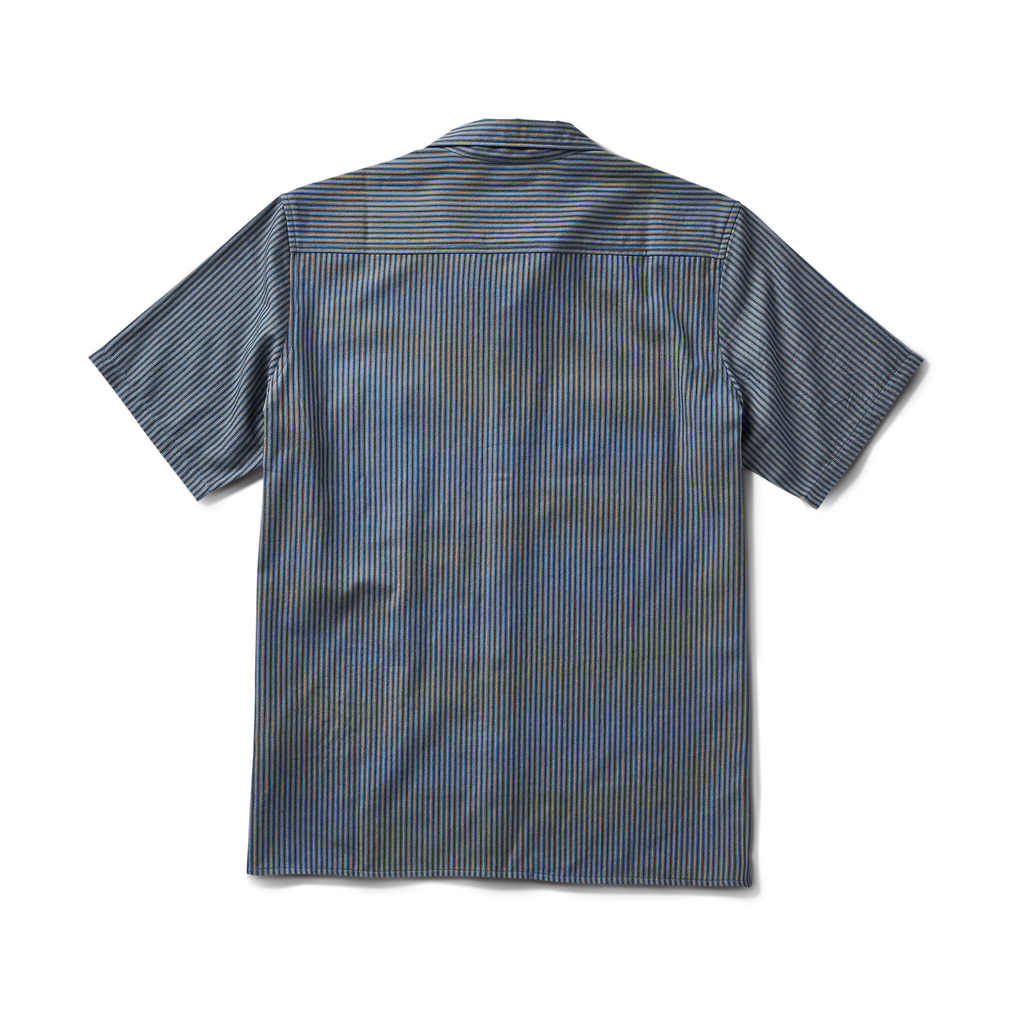 Close-up of a durable Roark adventure dress shirt featuring prominent buttons, a practical pocket, and designed sleeves for outdoor activities. Big Image - 10