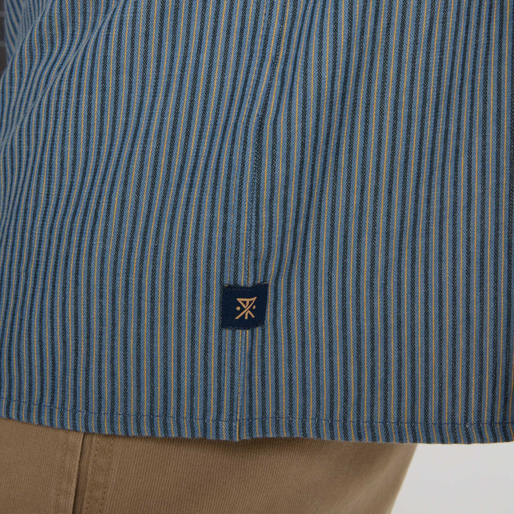 Detail of rugged denim dress shirt featuring durable buttons, designed for adventure and travel, by Roark Big Image - 9