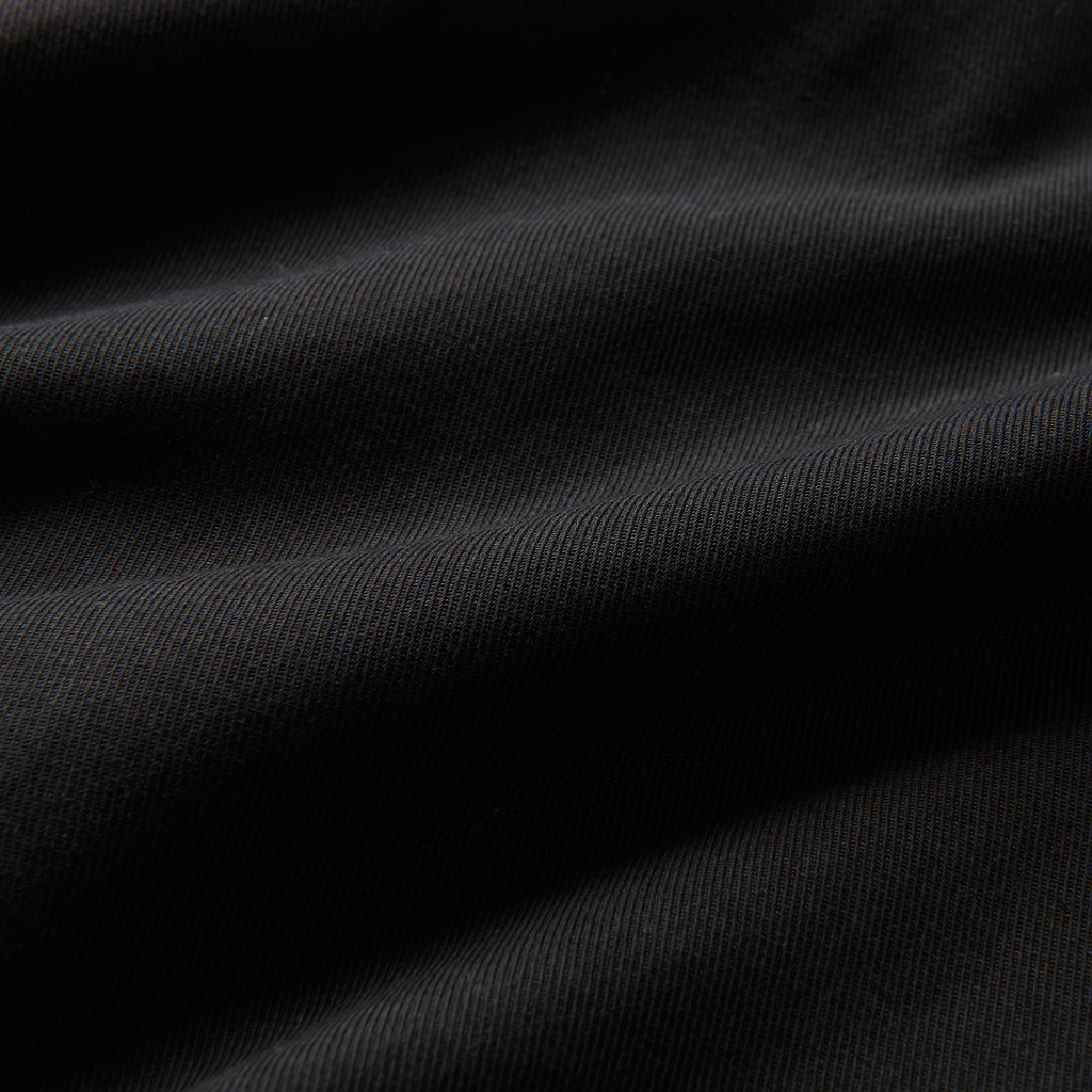 Close-up detail of a grey woven fabric texture, highlighting the durable quality of Roark's adventure-ready materials. Big Image - 14