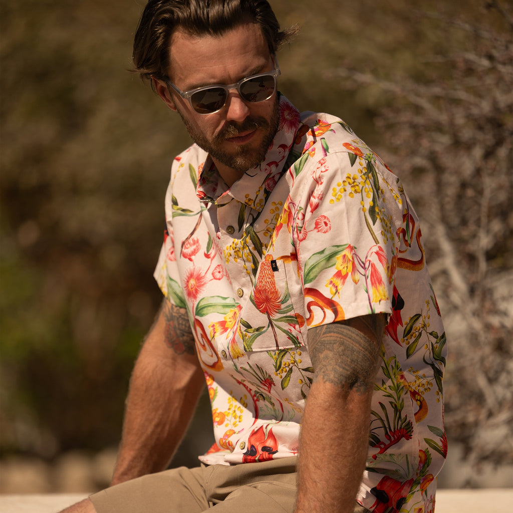 Man with a beard wearing a Roark dress shirt featuring a stylish collar and sleeves, engaging in outdoor adventures. Big Image - 3