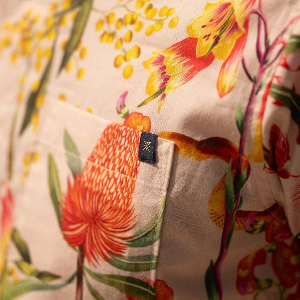 Vibrant yellow cut flowers arranged artistically, showcasing Roark's commitment to adventure-inspired aesthetics and design. Big Image - 6