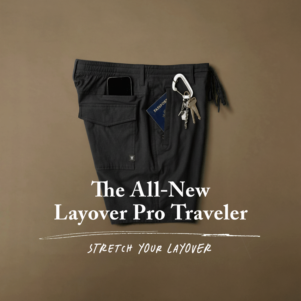 Black travel pants with keys on a brown background, featuring text 'The All-New Layover Pro Traveler'. Big Image - 2