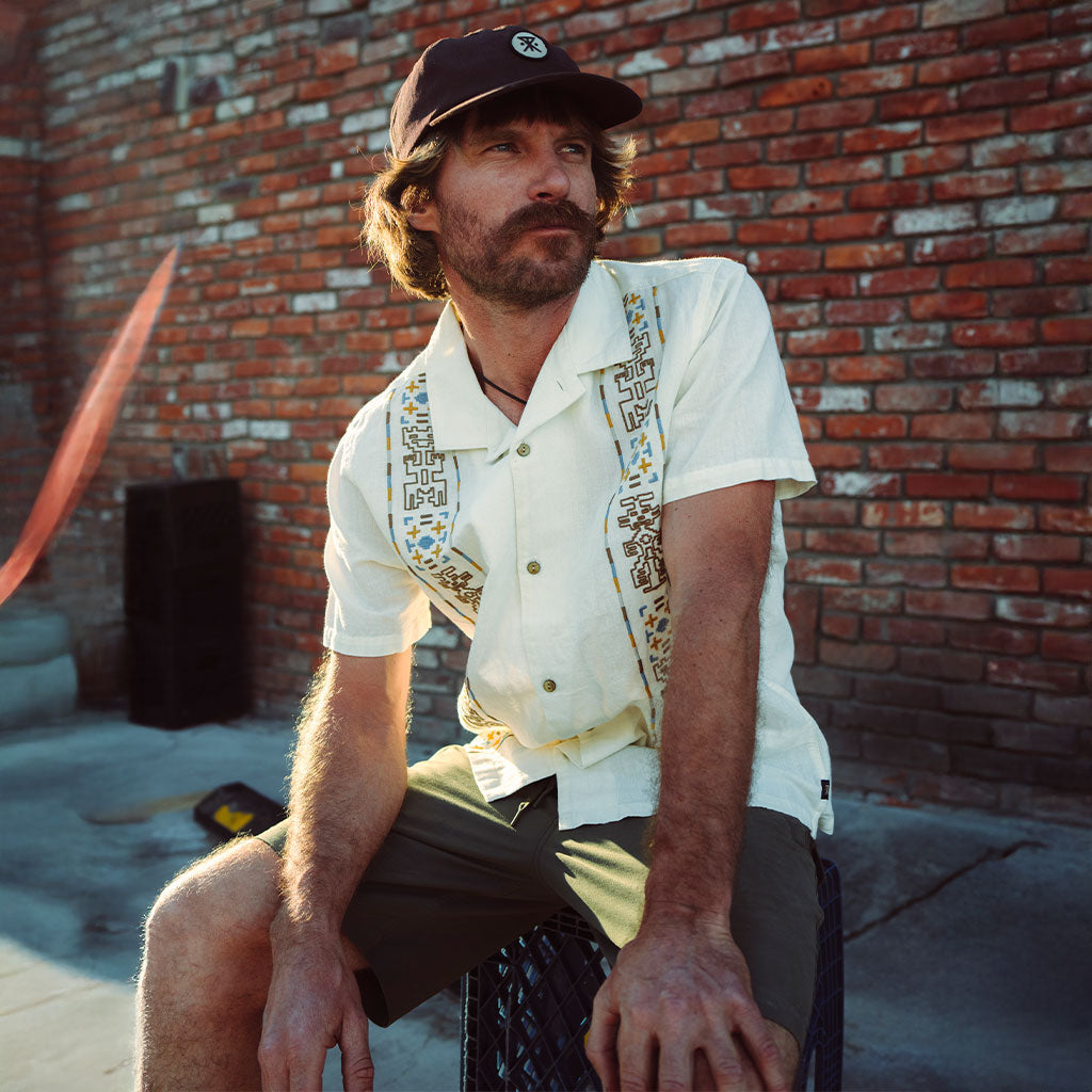 Drew Smith in the Roark Gonzo button up shirt with aztec pattern. Big Image - 2