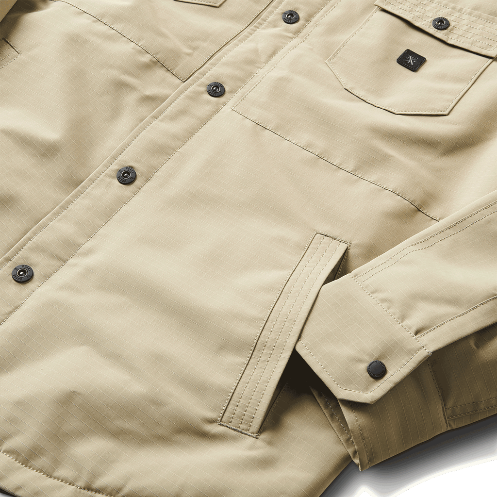 The front pocket of Roark men's Hebrides Weatherproof Jacket - Dusty Green Big Image - 9