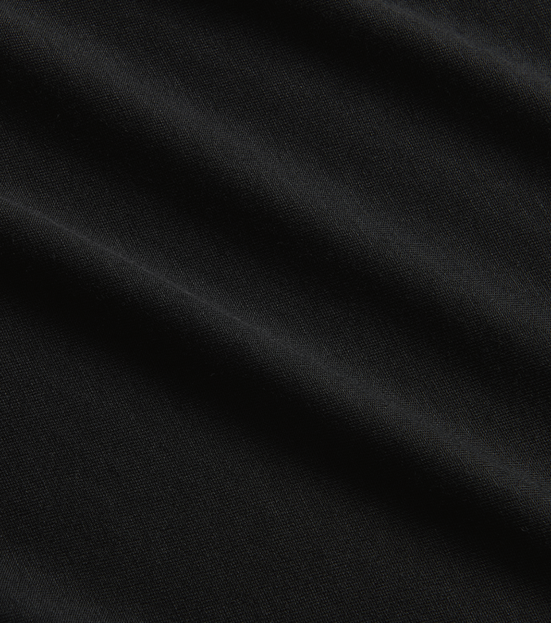 A close up of the Mathis Serpiente Short Sleeve Knit - Black Big Image - 7