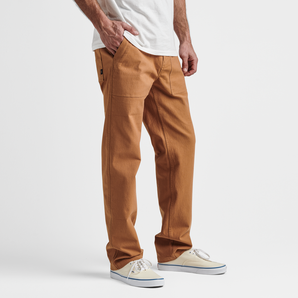 The model of Roark men's Layover Utility Pants - Pignoli Big Image - 4