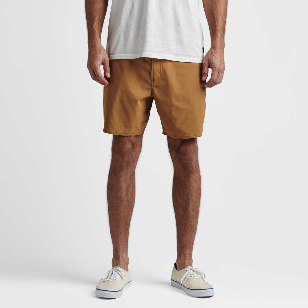 The model of Roark men's Layover Trail Shorts - Pignoli Big Image - 2