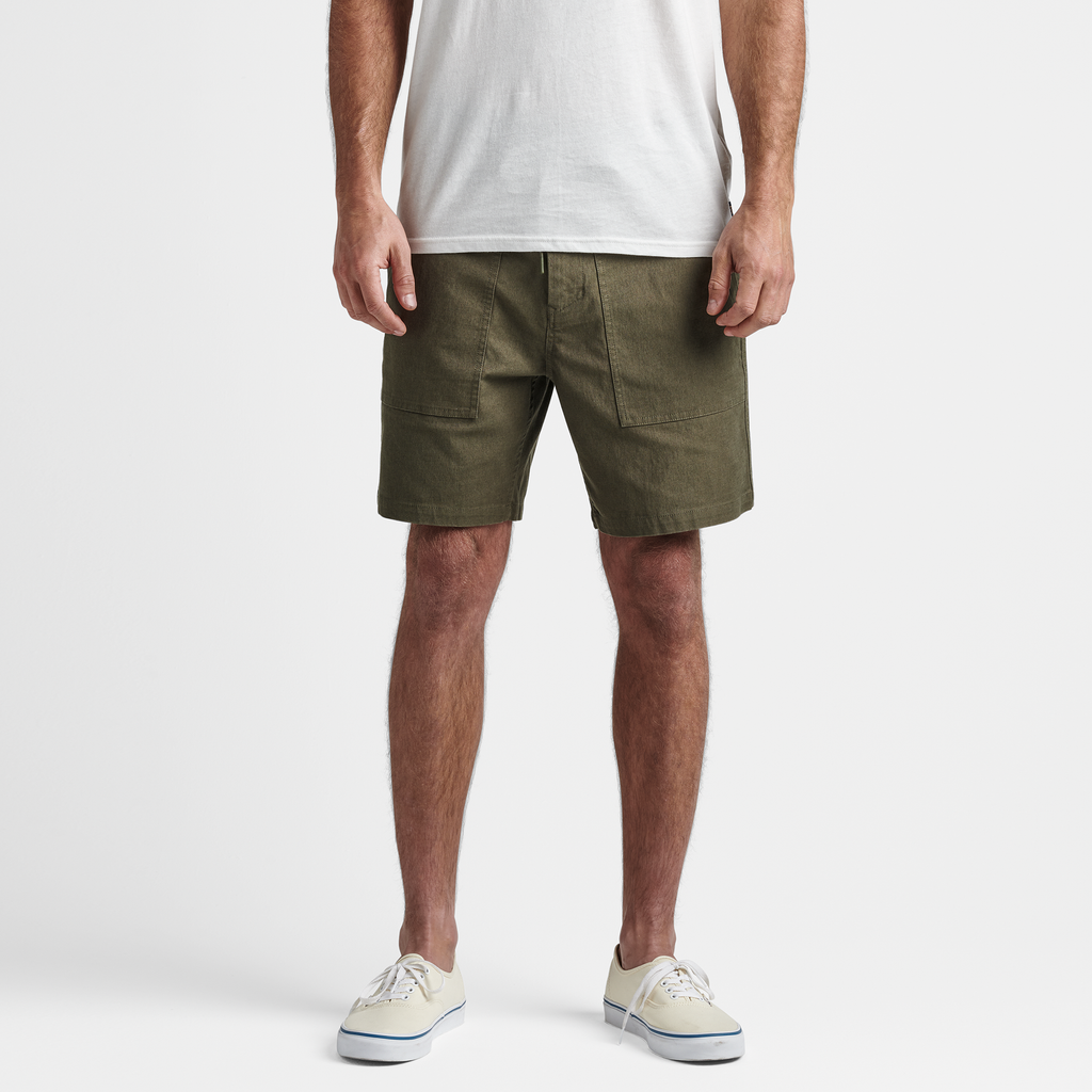 The model of Roark men's Layover Utility Shorts - Military Big Image - 2