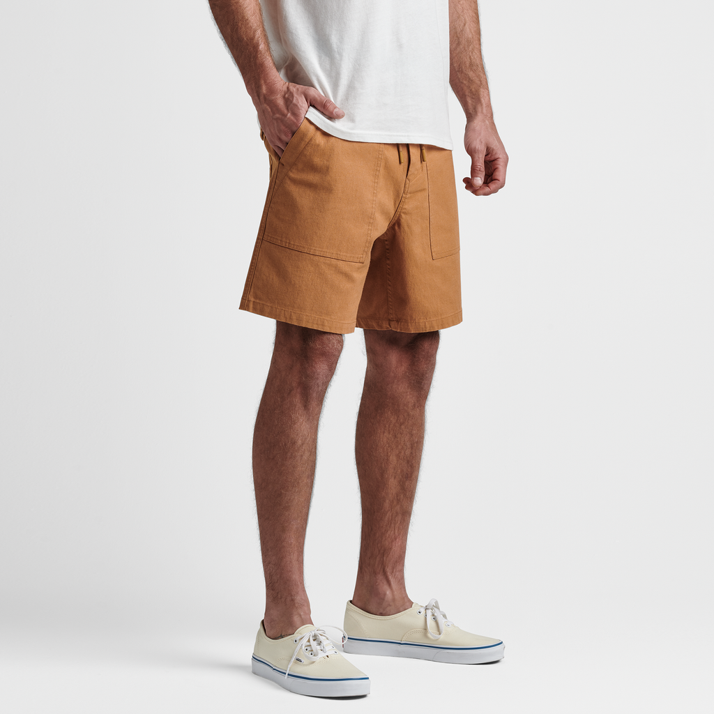 The model of Roark men's Layover Utility Shorts - Pignoli Big Image - 3