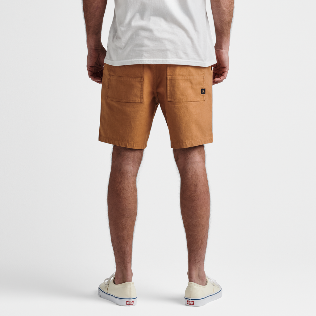 The model of Roark men's Layover Utility Shorts - Pignoli Big Image - 4